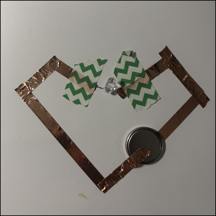 Using copper tape, I made a heart shape to get more familiar with identifying positives/negatives.