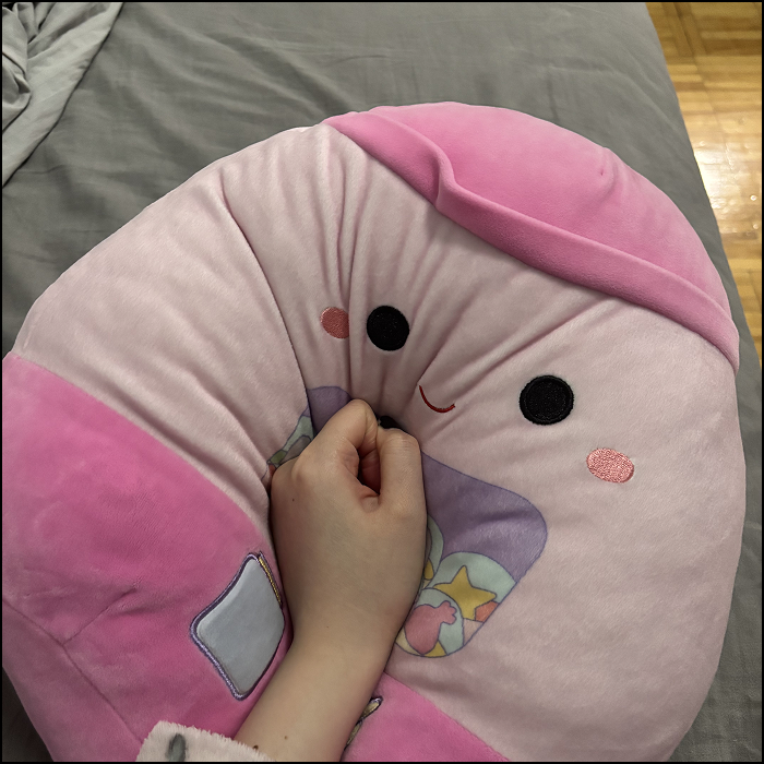 The sound of hitting the plushie with my fist.