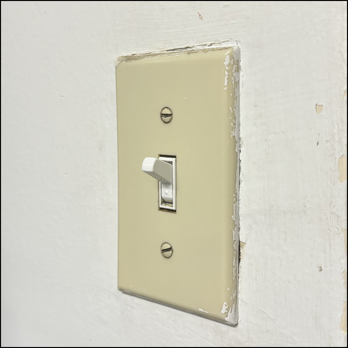 The sound of turning lights on and off.