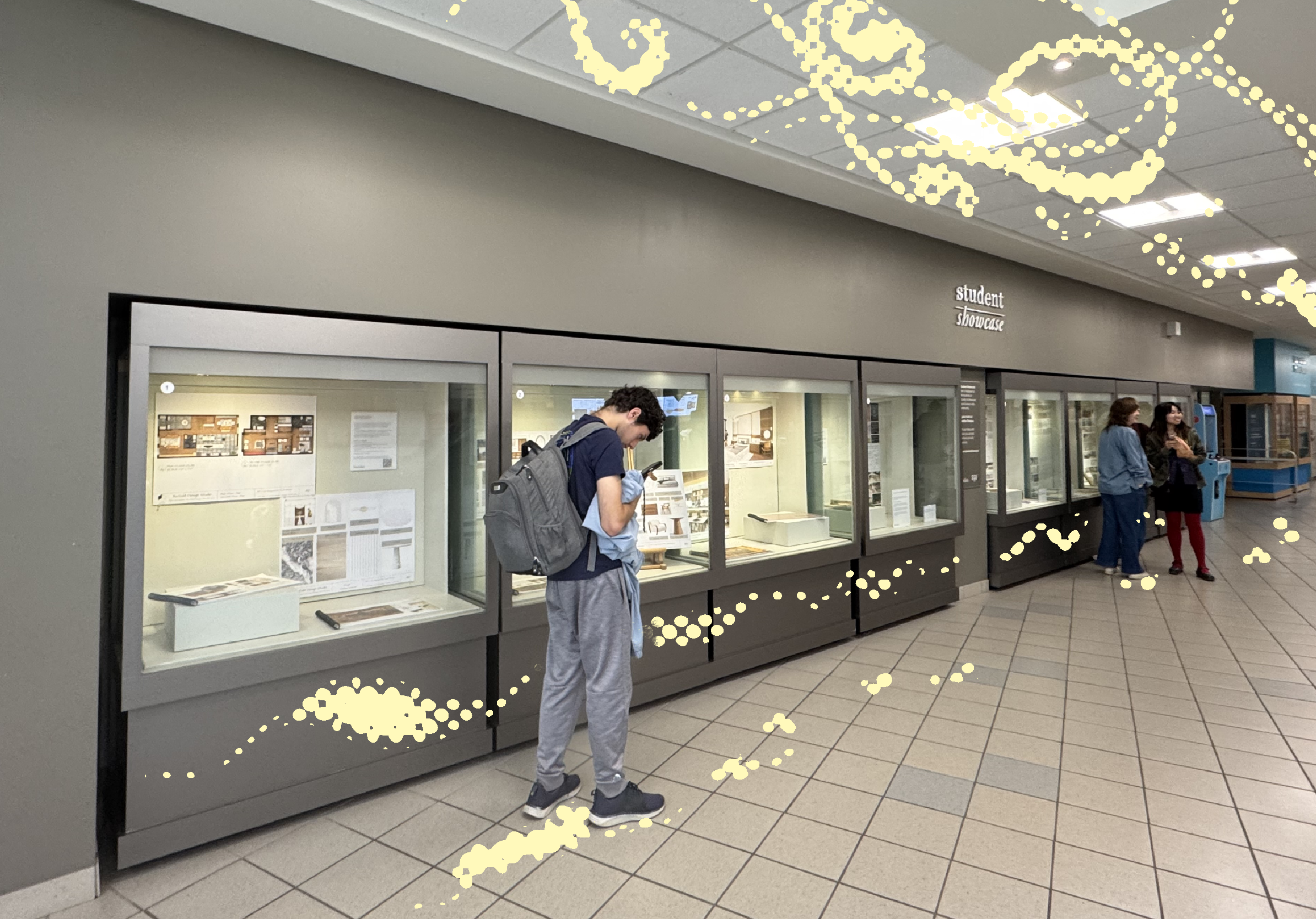 This concept focuses on showcasing student work using extended screens and representing interior design through varied materials applied across different tiles.