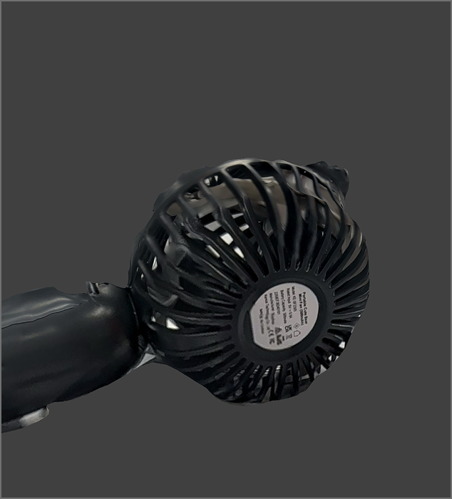 Back view of the mini-fan. The light were reflected on the fan is present.